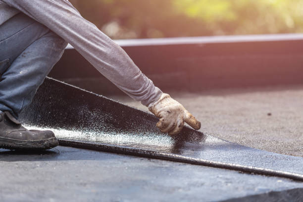 Professional Basement Waterproofing technician working in Tyrone, GA